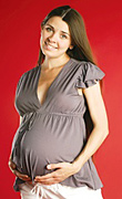 A pregnant woman. - Copyright – Stock Photo / Register Mark