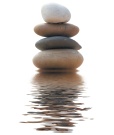 Smooth stones stacked on top of each other. - Copyright – Stock Photo / Register Mark