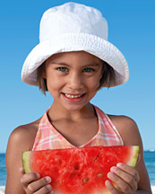 Girl holding watermelon - Copyright – Stock Photo / Register Mark