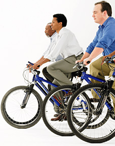men riding bikes - Copyright – Stock Photo / Register Mark