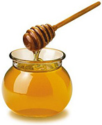 A bowl of honey. - Copyright – Stock Photo / Register Mark