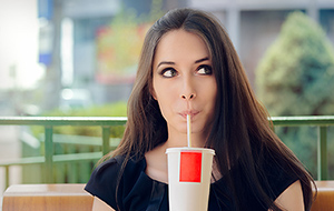 drinking soda - Copyright – Stock Photo / Register Mark