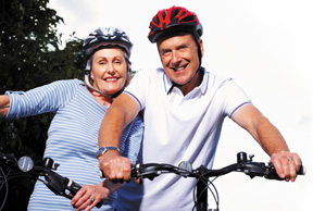 man and woman biking - Copyright – Stock Photo / Register Mark