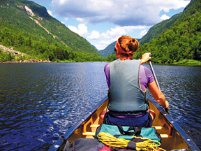 woman kayaking - Copyright – Stock Photo / Register Mark