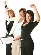 Three women holding up an arm in triumph. - Copyright – Stock Photo / Register Mark