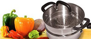 Collection of various types of peppers and a steamer pot. - Copyright – Stock Photo / Register Mark