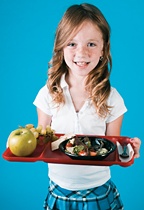 Little girl holding a caffeteria tray full of healthy food. - Copyright – Stock Photo / Register Mark