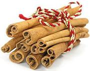 A bundle of cinnamon sticks. - Copyright – Stock Photo / Register Mark