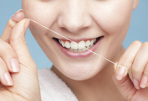 flossing - Copyright â€“ Stock Photo / Register Mark