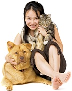A young woman with her dog and cat. - Copyright – Stock Photo / Register Mark
