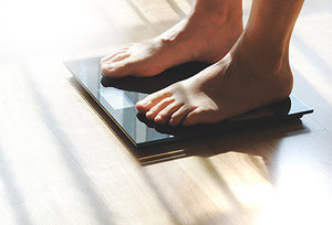weight gain - Copyright – Stock Photo / Register Mark