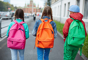 kids with backpacks - Copyright – Stock Photo / Register Mark