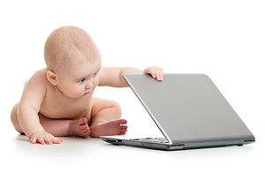 baby and laptop - Copyright – Stock Photo / Register Mark