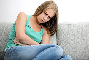 menstrual symptoms - Copyright – Stock Photo / Register Mark