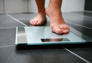 weight gain - Copyright – Stock Photo / Register Mark