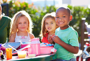 children eating lunch - Copyright – Stock Photo / Register Mark