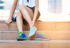 ankle pain - Copyright – Stock Photo / Register Mark