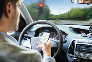 texting while driving - Copyright – Stock Photo / Register Mark