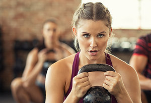 weight lifting - Copyright – Stock Photo / Register Mark