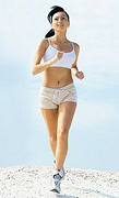 Woman jogging. - Copyright – Stock Photo / Register Mark