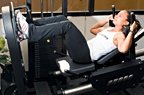 Chelsea Cooper demonstrates the leg press. - Copyright – Stock Photo / Register Mark