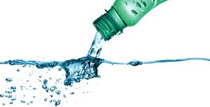 Bottled water being poured out. - Copyright – Stock Photo / Register Mark