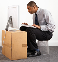 Man using computer - Copyright – Stock Photo / Register Mark