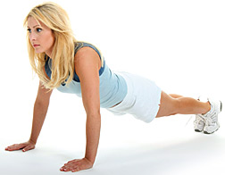 lady doing push-up - Copyright – Stock Photo / Register Mark