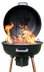 An open outdoor grill with roaring flames. - Copyright – Stock Photo / Register Mark