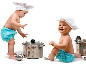 Two babies in chef hats playing with pots and ladles. - Copyright – Stock Photo / Register Mark