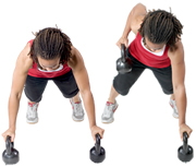 Personal trainer Chelsea Cooper domonstrates a Renegade Row with Kettlebells. - Copyright – Stock Photo / Register Mark