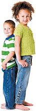 Two children standing back-to-back. - Copyright – Stock Photo / Register Mark