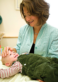 woman and baby - Copyright – Stock Photo / Register Mark