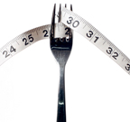 A fork with a tape measure wrapped through the tines. - Copyright – Stock Photo / Register Mark