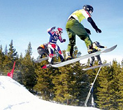 Marc Schulz competing in snowboard racing. - Copyright – Stock Photo / Register Mark