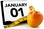A daily calendar, a tape measure and an apple. - Copyright – Stock Photo / Register Mark