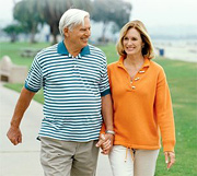 An elderly couple walking near beach. - Copyright â€“ Stock Photo / Register Mark