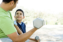 Start Them Off Right Dad & Son - Copyright – Stock Photo / Register Mark