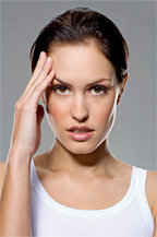 Woman focusing her attention. - Copyright – Stock Photo / Register Mark